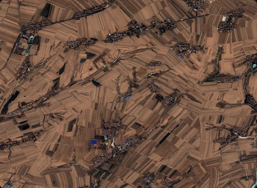 3月3日，“吉林一號(hào)”拍攝的梨樹(shù)縣國(guó)家百萬(wàn)畝綠色食品原料（玉米）標(biāo)準(zhǔn)化生產(chǎn)基地核心示范區(qū)。（長(zhǎng)光衛(wèi)星供圖）